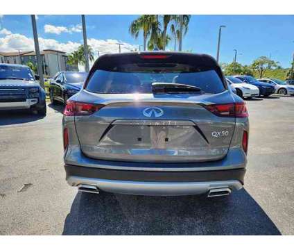 2024 Infiniti Qx50 Luxe is a Grey 2024 Infiniti QX50 Luxe SUV in Fort Lauderdale FL