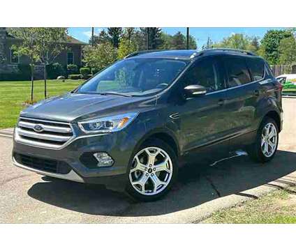 2019 Ford Escape Titanium is a Silver 2019 Ford Escape Titanium SUV in Ortonville MI