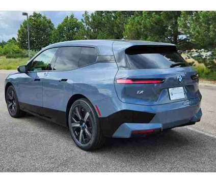 2025 BMW iX xDrive50 is a 2025 BMW 325 Model iX SUV in Loveland CO