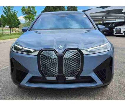 2025 BMW iX xDrive50 is a 2025 BMW 325 Model iX SUV in Loveland CO