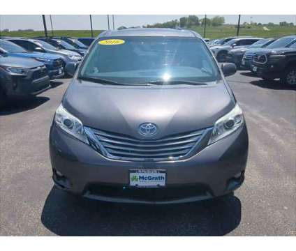 2016 Toyota Sienna XLE 8 Passenger is a Silver 2016 Toyota Sienna XLE Van in Dubuque IA