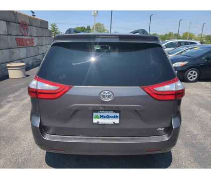 2016 Toyota Sienna XLE 8 Passenger is a Silver 2016 Toyota Sienna XLE Van in Dubuque IA