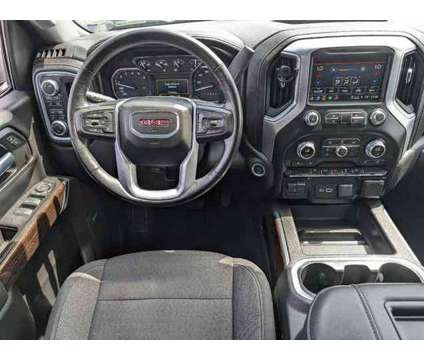 2021 GMC Sierra 1500 4WD Crew Cab Short Box Elevation is a Black 2021 GMC Sierra 1500 Truck in Englewood CO