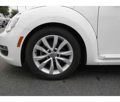 2015 Volkswagen Beetle 2.0L TDI is a White 2015 Volkswagen Beetle 2.0L TDI Convertible in Goldsboro NC
