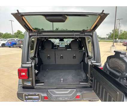 2024 Jeep Wrangler 4xe Rubicon 4xe is a Black 2024 Jeep Wrangler SUV in Brookshire TX