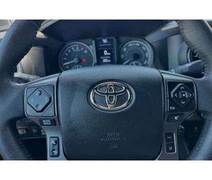 2021 Toyota Tacoma SR5 V6 is a Grey 2021 Toyota Tacoma SR5 Truck in Visalia CA