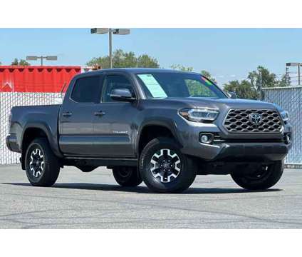 2021 Toyota Tacoma SR5 V6 is a Grey 2021 Toyota Tacoma SR5 Truck in Visalia CA