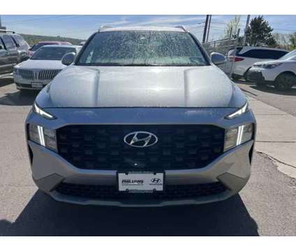 2023 Hyundai Santa Fe SEL is a Silver 2023 Hyundai Santa Fe SUV in Colorado Springs CO