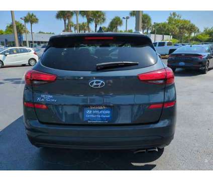2020 Hyundai Tucson SEL is a Blue 2020 Hyundai Tucson SE SUV in Daytona Beach FL