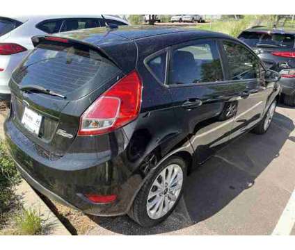 2014 Ford Fiesta SE is a Black 2014 Ford Fiesta SE Hatchback in Colorado Springs CO