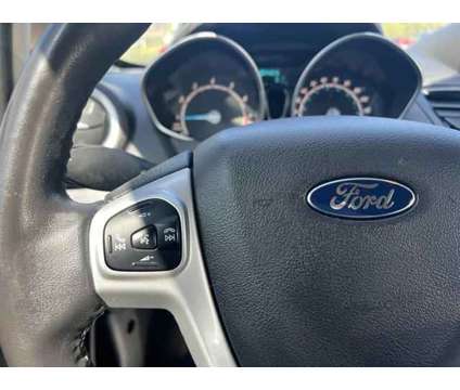 2014 Ford Fiesta SE is a Black 2014 Ford Fiesta SE Hatchback in Colorado Springs CO