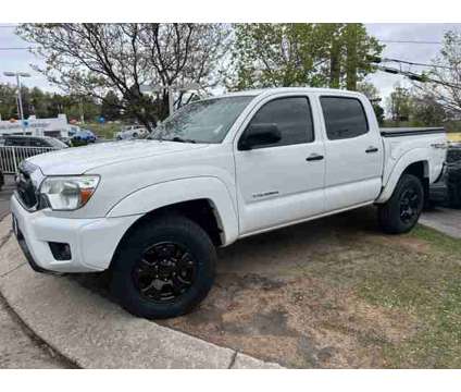 2014 Toyota Tacoma Base V6 is a White 2014 Toyota Tacoma Base Truck in Colorado Springs CO