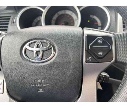 2014 Toyota Tacoma Base V6 is a White 2014 Toyota Tacoma Base Truck in Colorado Springs CO