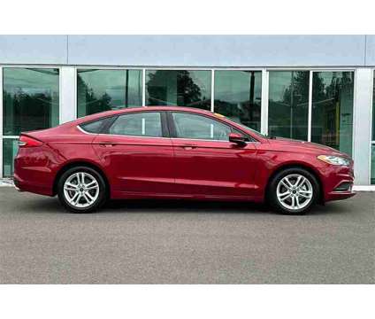 2018 Ford Fusion SE is a Red 2018 Ford Fusion SE Sedan in Salem OR