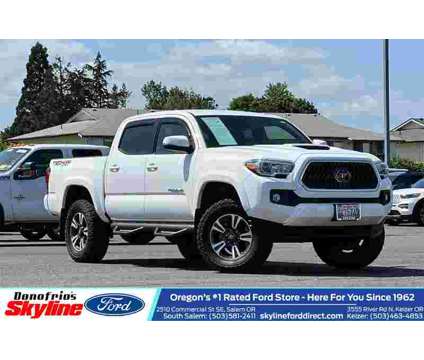 2018 Toyota Tacoma TRD Sport V6 is a White 2018 Toyota Tacoma TRD Sport Truck in Salem OR