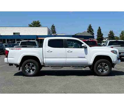 2018 Toyota Tacoma TRD Sport V6 is a White 2018 Toyota Tacoma TRD Sport Truck in Salem OR