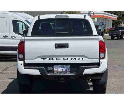 2018 Toyota Tacoma TRD Sport V6 is a White 2018 Toyota Tacoma TRD Sport Truck in Salem OR