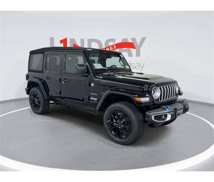 2024 Jeep Wrangler Sahara 4xe is a Black 2024 Jeep Wrangler Sahara SUV in Manassas VA