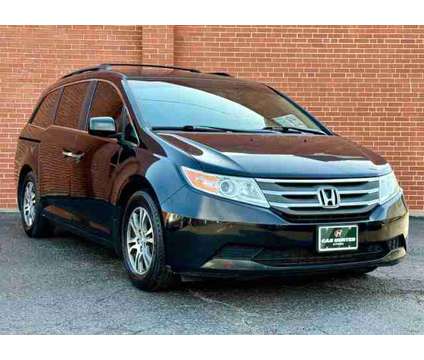 2012 Honda Odyssey for sale is a Black 2012 Honda Odyssey Car for Sale in Highland Park IL