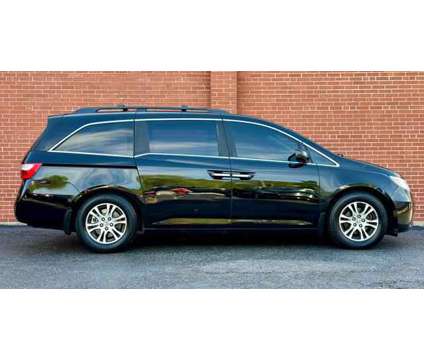 2012 Honda Odyssey for sale is a Black 2012 Honda Odyssey Car for Sale in Highland Park IL