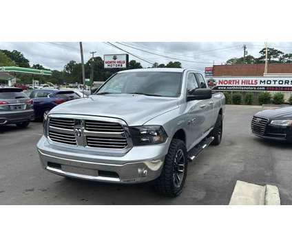2016 Ram 1500 Quad Cab for sale is a Silver 2016 RAM 1500 Model Car for Sale in Raleigh NC