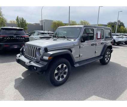 2018 Jeep Wrangler Unlimited Sport S is a Silver 2018 Jeep Wrangler Unlimited Sport Car for Sale in Boulder CO