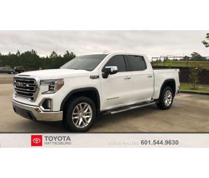 2019 GMC Sierra 1500 SLT is a White 2019 GMC Sierra 1500 SLT Car for Sale in Hattiesburg MS