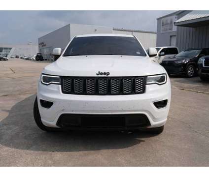 2021 Jeep Grand Cherokee Laredo X is a White 2021 Jeep grand cherokee Laredo Car for Sale in Baton Rouge LA