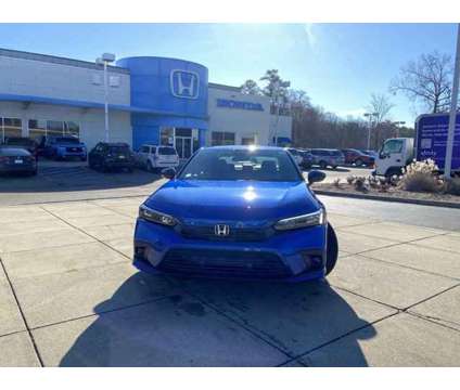 2024 Honda Civic Sedan Sport is a Blue 2024 Honda Civic Sedan in Ridgeland MS