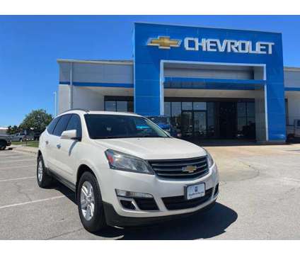 2014 Chevrolet Traverse LT is a White 2014 Chevrolet Traverse LT Car for Sale in Olathe KS