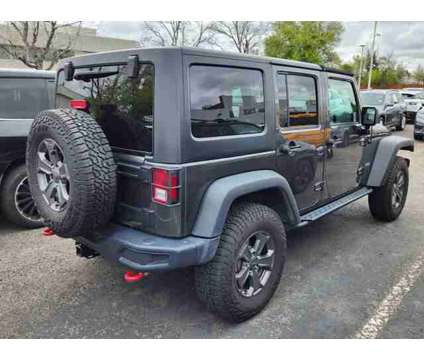 2017 Jeep Wrangler Unlimited Rubicon Recon is a Grey 2017 Jeep Wrangler Unlimited Rubicon Car for Sale in Denver CO