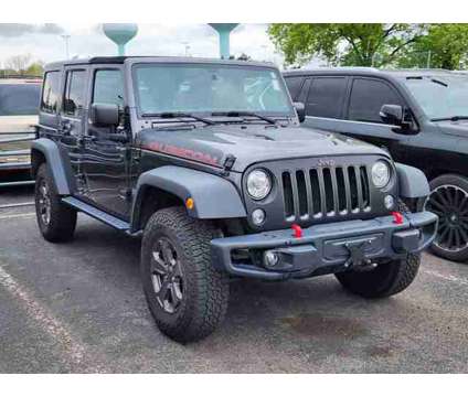 2017 Jeep Wrangler Unlimited Rubicon Recon is a Grey 2017 Jeep Wrangler Unlimited Rubicon Car for Sale in Denver CO