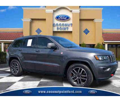 2020 Jeep Grand Cherokee Trailhawk is a Grey 2020 Jeep grand cherokee Trailhawk Car for Sale in Estero FL