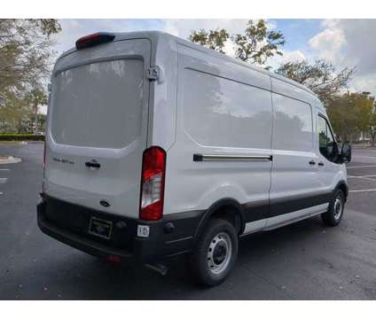 2024 Ford Transit Cargo Van Base Rear-Wheel Drive Medium Roof Van 148 in. WB is a White 2024 Ford Transit Van in Estero FL