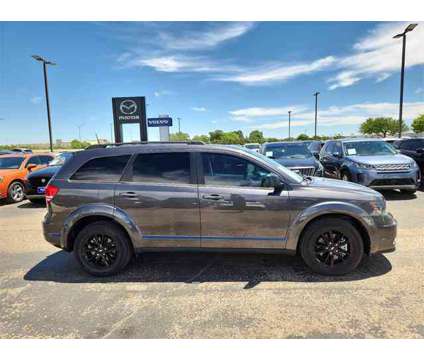 2020 Dodge Journey SE Value is a Grey 2020 Dodge Journey SE Car for Sale in Lubbock TX