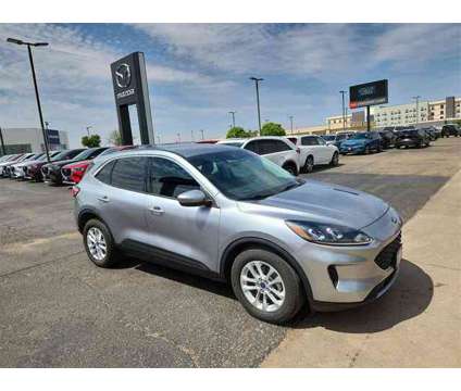 2021 Ford Escape SE Hybrid is a Silver 2021 Ford Escape SE Hybrid in Lubbock TX