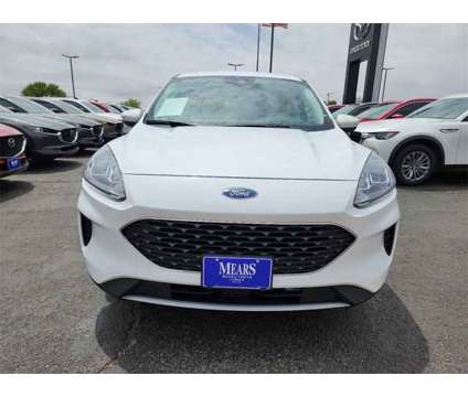 2021 Ford Escape SE Hybrid is a White 2021 Ford Escape SE Hybrid in Lubbock TX