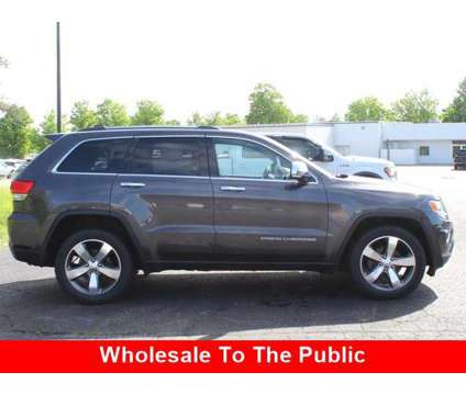 2015 Jeep Grand Cherokee Limited is a Grey 2015 Jeep grand cherokee Limited Car for Sale in Traverse City MI