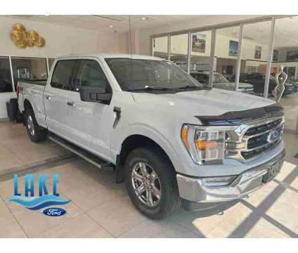 2021UsedFordUsedF-150 is a White 2021 Ford F-150 Car for Sale in Milwaukee WI