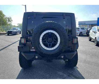 2017UsedJeepUsedWrangler UnlimitedUsed4x4 is a Black 2017 Jeep Wrangler Unlimited Car for Sale in Bedford IN