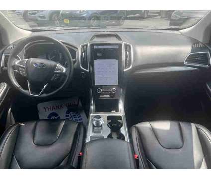 2022UsedFordUsedEdgeUsedAWD is a Grey 2022 Ford Edge Car for Sale in San Antonio TX