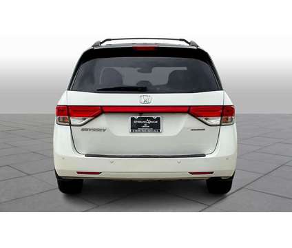 2015UsedHondaUsedOdysseyUsed5dr is a White 2015 Honda Odyssey Car for Sale in Houston TX