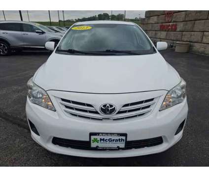 2013 Toyota Corolla LE is a White 2013 Toyota Corolla LE Sedan in Dubuque IA