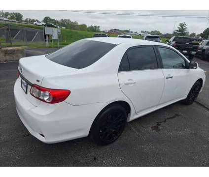 2013 Toyota Corolla S is a White 2013 Toyota Corolla S Sedan in Dubuque IA