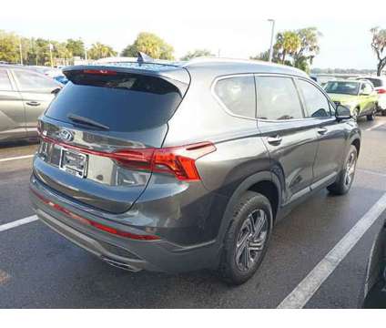 2023 Hyundai Santa Fe SEL is a Grey 2023 Hyundai Santa Fe SUV in Leesburg FL