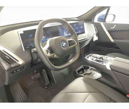 2025 BMW iX xDrive50 is a Blue 2025 BMW 325 Model iX SUV in Freeport NY
