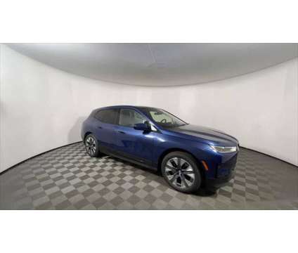 2025 BMW iX xDrive50 is a Blue 2025 BMW 325 Model iX SUV in Freeport NY