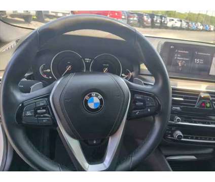 2018 BMW 5 Series xDrive is a White 2018 BMW 5-Series Sedan in Dubuque IA