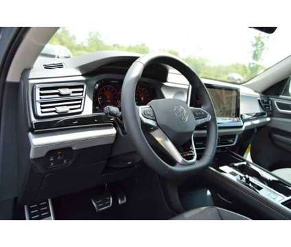 2024 Volkswagen Atlas 2.0T Peak Edition SEL is a Grey 2024 Volkswagen Atlas SUV in Highland Park IL