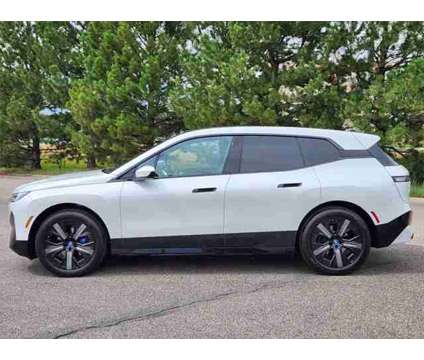 2025 BMW iX xDrive50 is a White 2025 BMW 325 Model iX SUV in Loveland CO